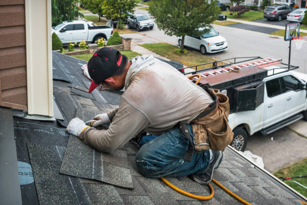 Professional Flat Roof Repair technician working in Connersville, IN